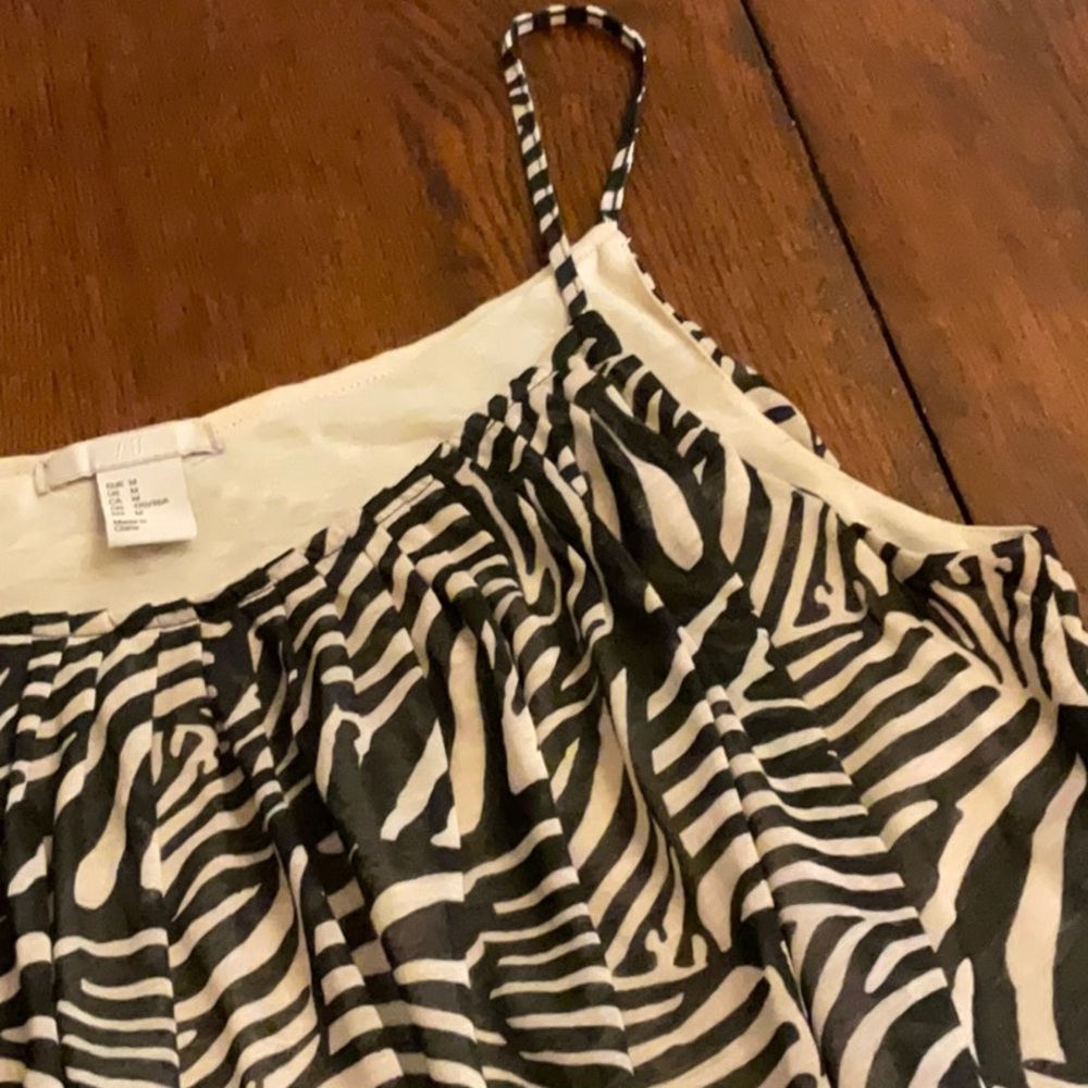 Wonderful casual/dressy blousy tank. Wonderful & flattering design.  Attractive